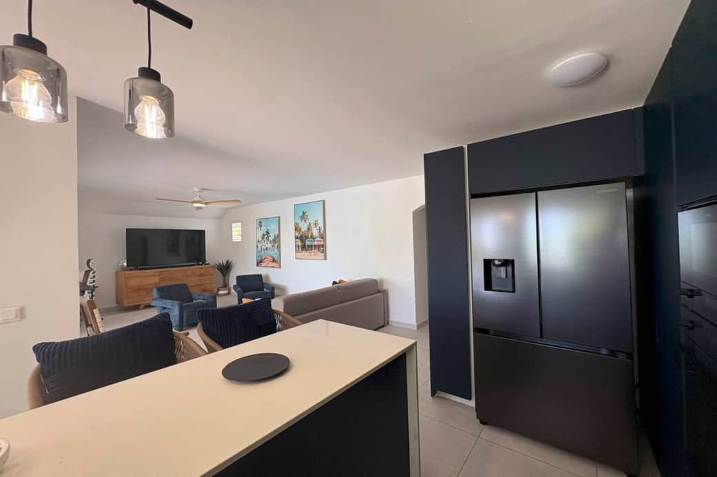 Kitchen open to the entrance hall and living room Koray 