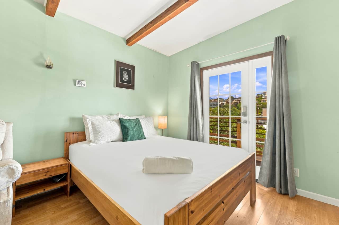 Cozy Bedroom w/ Balcony Access