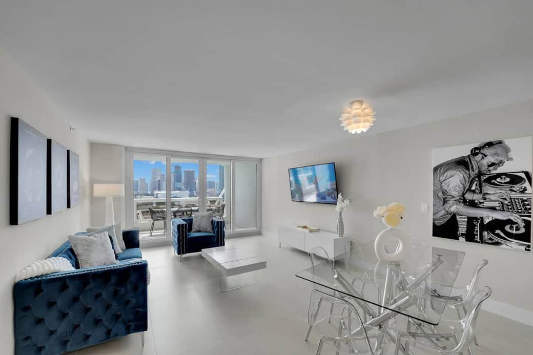 Living room, dining area, balcony access, Downtown Miami skyline