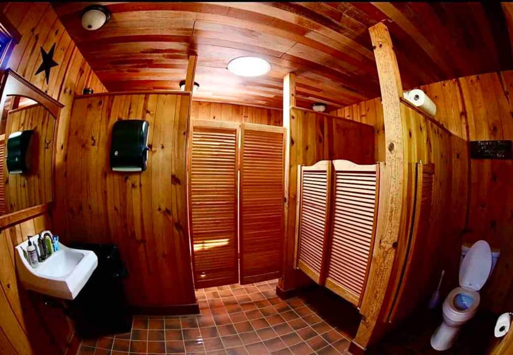 For total privacy and health concerns, this is the locked dedicated bathroom just for your family during your stay. It has hot and cold water and showers too. It is less than a minute walk from the Fish Camp residence. For total privacy and health concerns, this is the locked dedicated bathroom just for your family during your stay. It has hot and cold water and showers too. It is less than a minute walk from the Fish Camp residence.