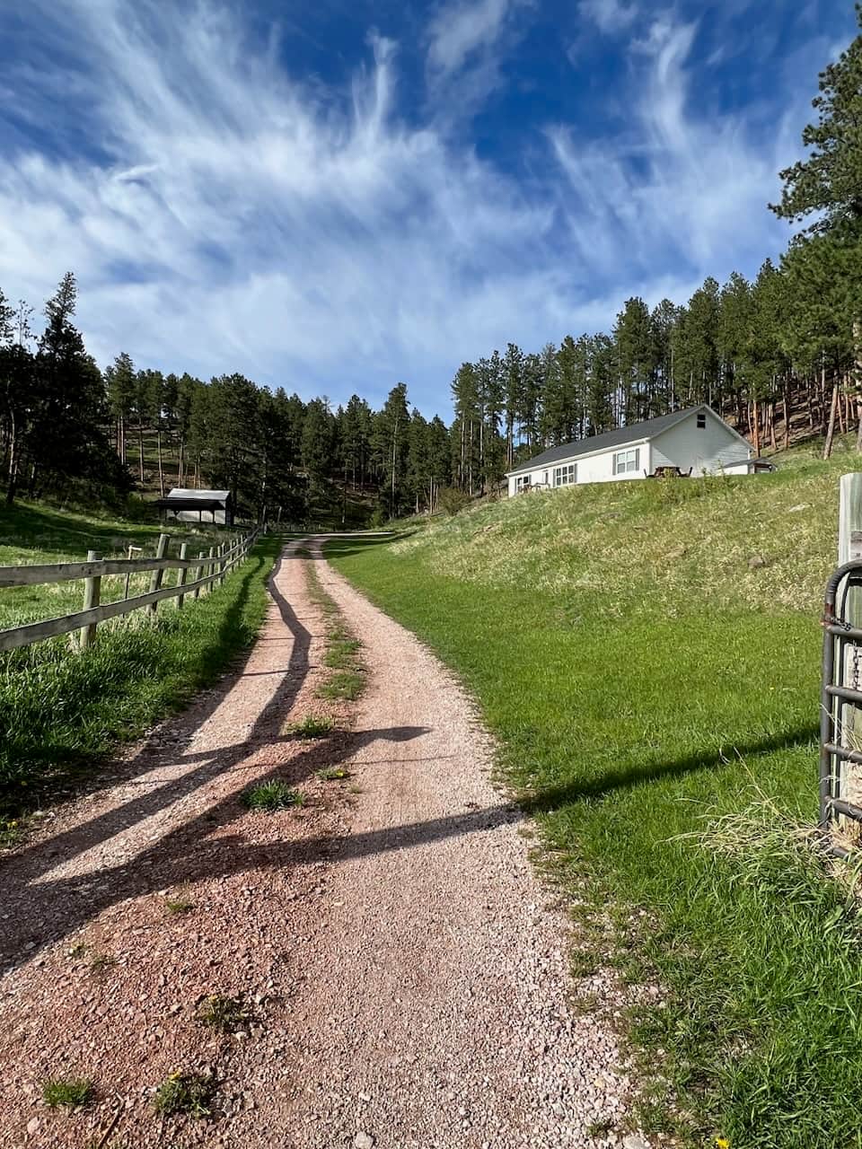 Front of House as driving up from Highway 385 - Homestead