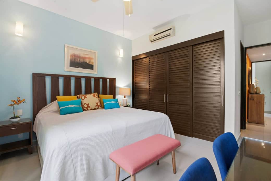 Bedroom 1 also includes a spacious closet, ensuite bathroom, bedside lamps, convenient light switches, and easily accessible outlets to charge your devices. Designed for comfort and convenience.