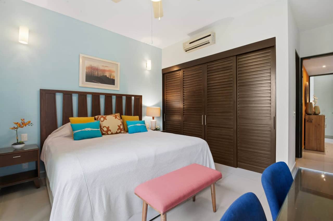 Bedroom 1 also includes a spacious closet, ensuite bathroom, bedside lamps, convenient light switches, and easily accessible outlets to charge your devices. Designed for comfort and convenience.
