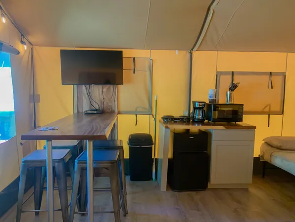 Kitchenette comes with microwave, hot plate, coffee maker, blender, cooking utensils Kitchenette comes with microwave, hot plate, coffee maker, blender, cooking utensils
