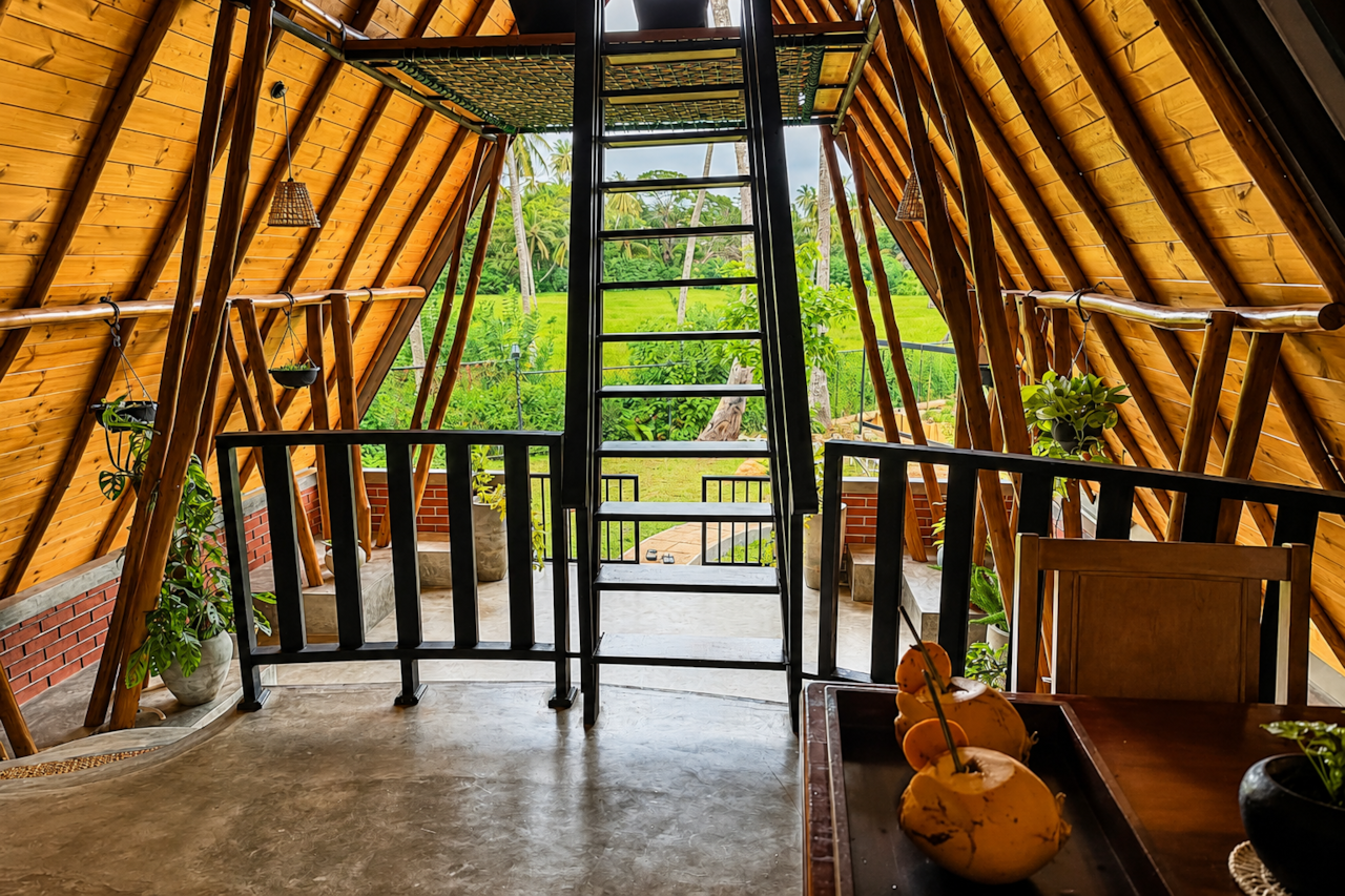 Open net bed above the main living space