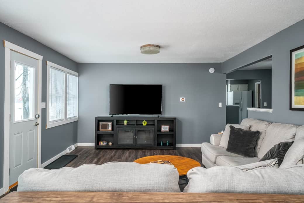 Kick back on the couch to watch a movie or enjoy the river views