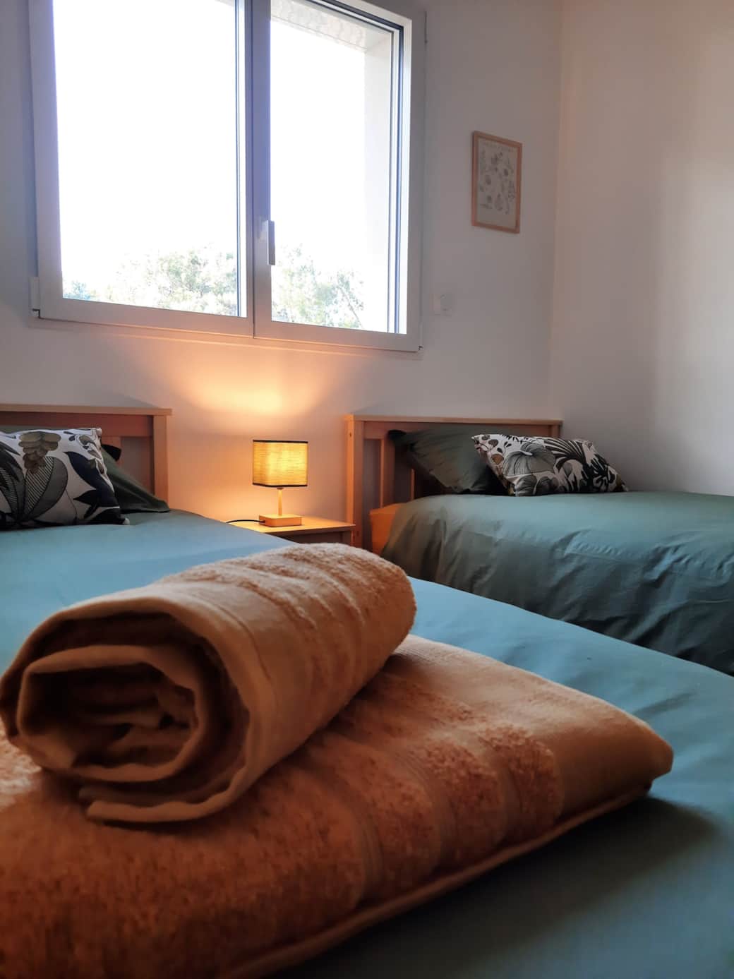 Chambre avec deux lits simples