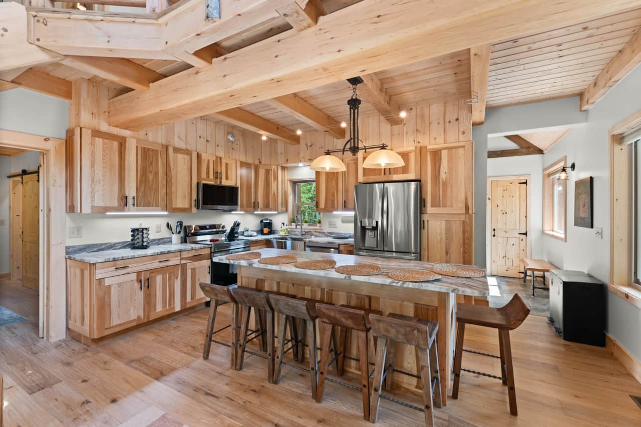 Kitchen and dining area with stainless appliances and granite countertops