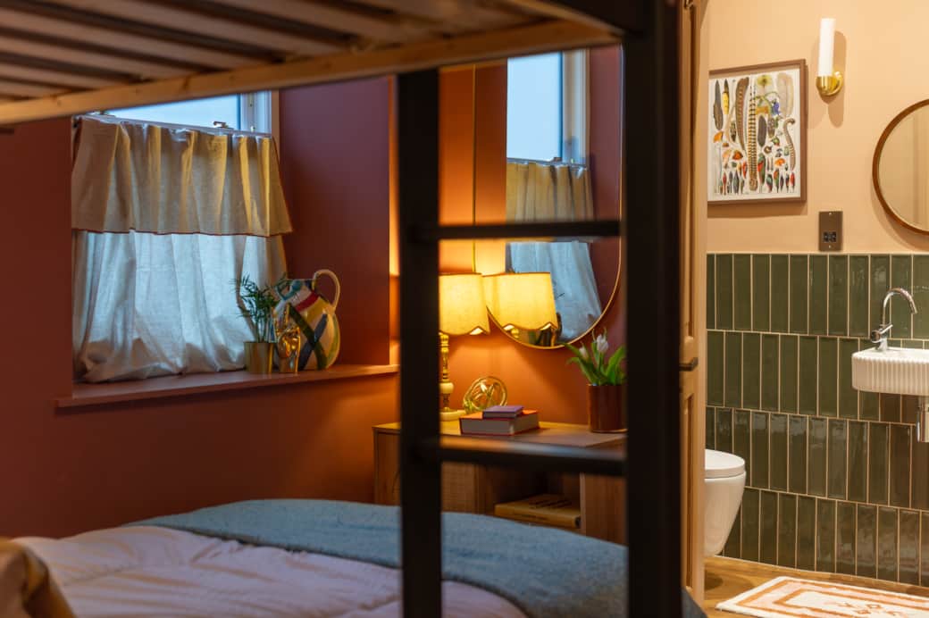 Ambient lighting in the bathroom creates a calming, spa-like experience.