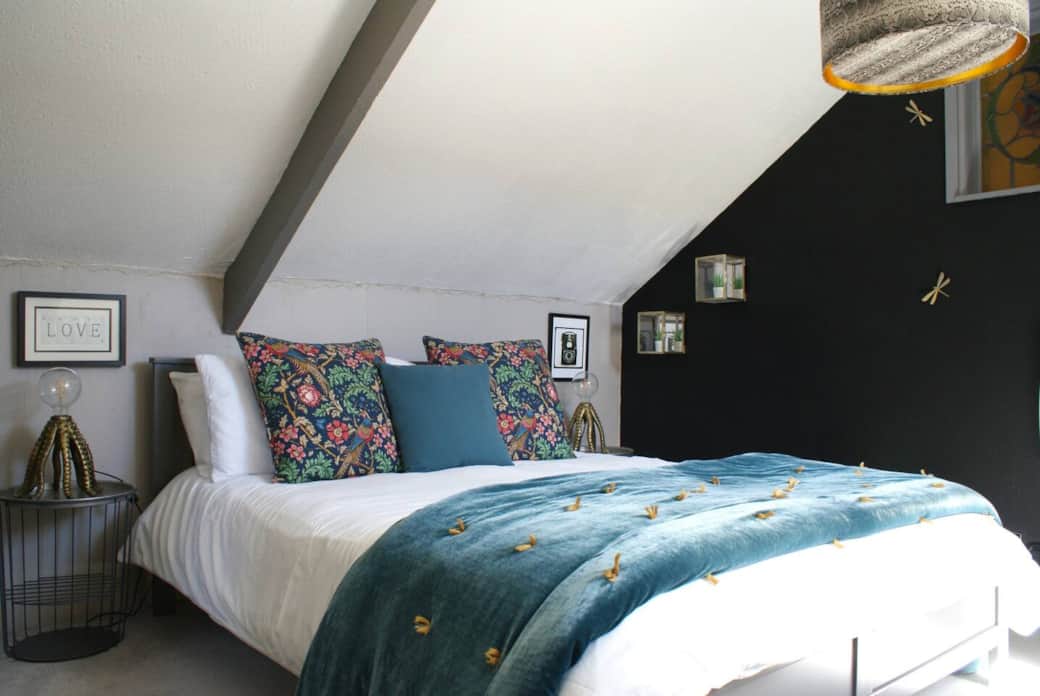 The characterful main bedroom.
