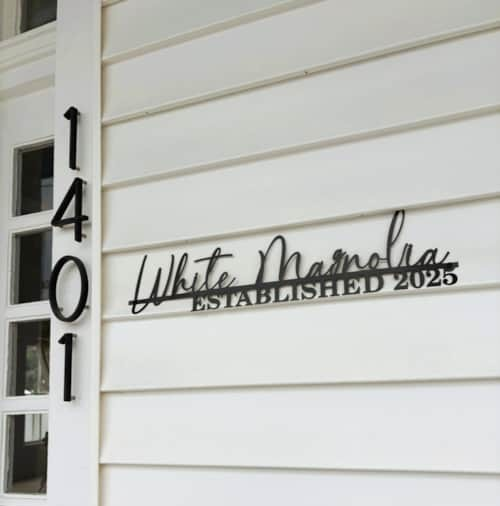 Front view of White Magnolia Galveston with historic details and front porch