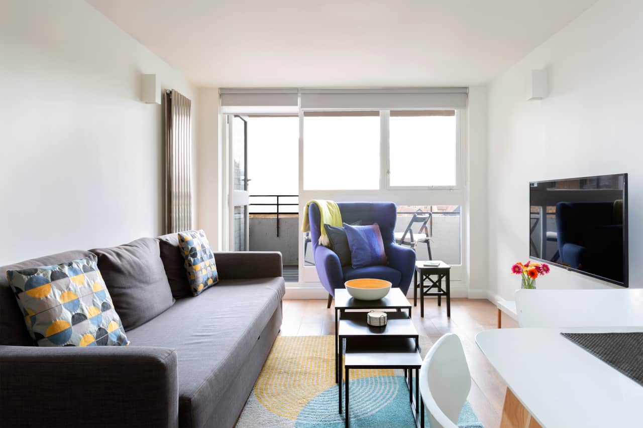 Living room with balcony access, Marina View apartment