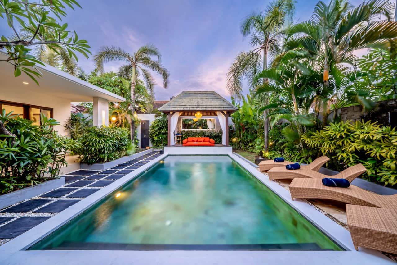Villa Melbourne’s private pool, tropical gardens and shaded lounge pavilion.
