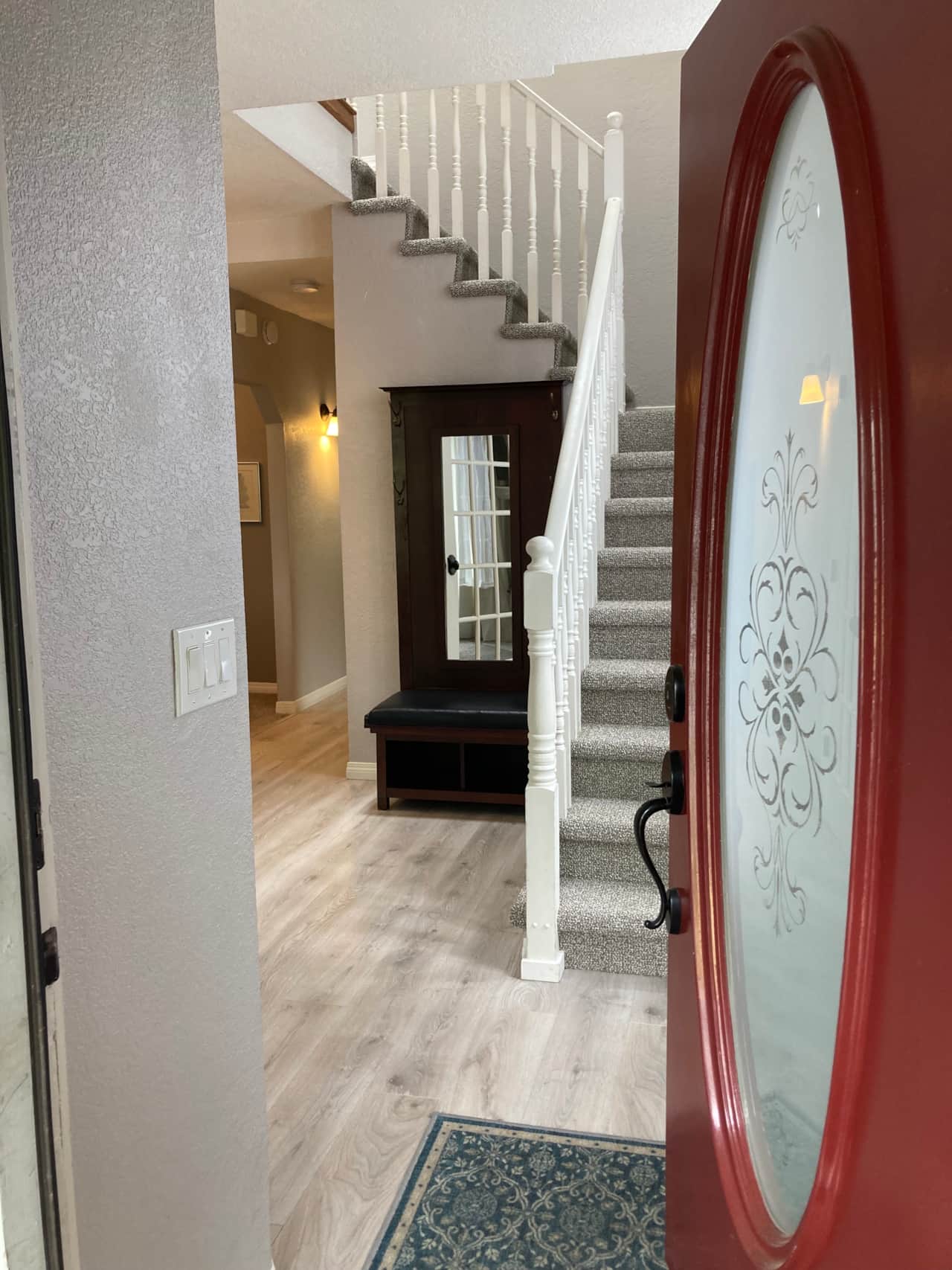 Entry goes left to living or up to bedrooms