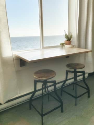 Waves crashing under you while you enjoy your morning coffee!