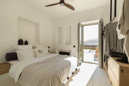 Bedroom with air-condition and ceiling fan.
Beautiful view of Paros and the Aegean Sea
