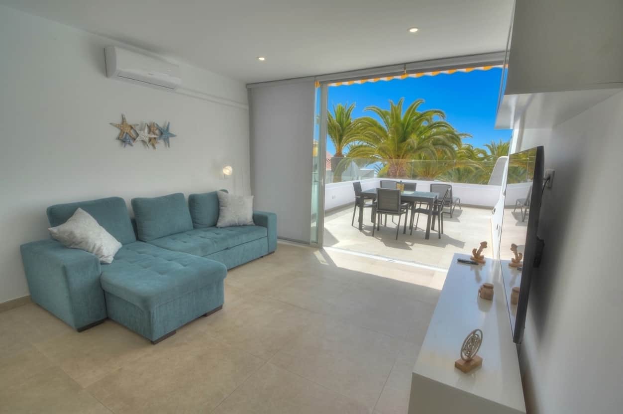 View of the living room with direct access to the terrace