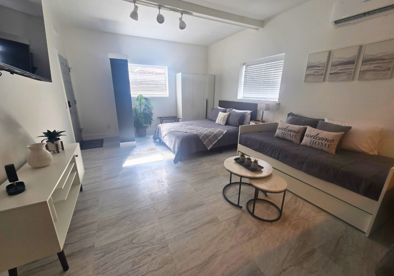 Enjoy a spacious closet, stylish nightstand, decorative lamp & charming artwork. Lakeland, FL 