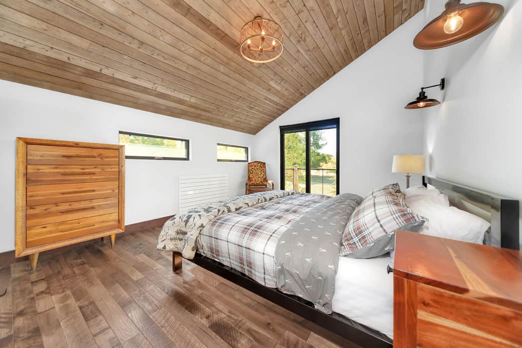 upstairs bedroom with king bed