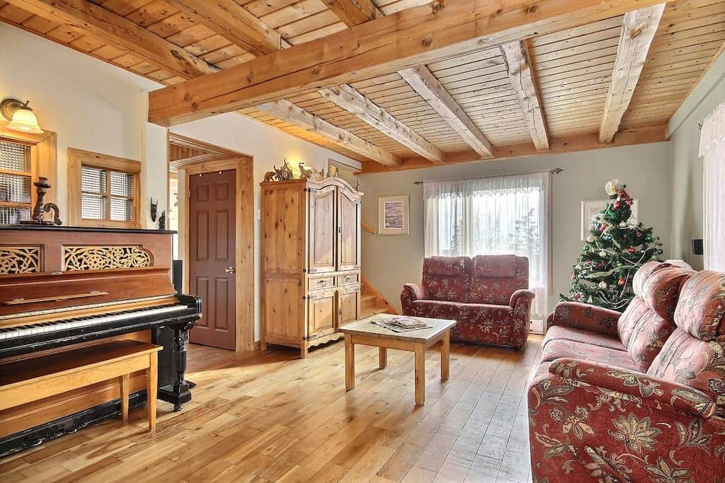 Living room with piano, different angle Living room with piano, different angle