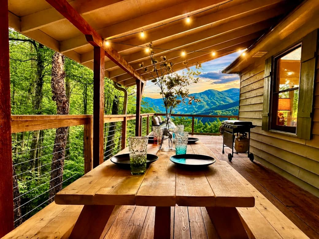Step right outside the kitchen onto the covered deck and enjoy a meal at the picnic table. Step right outside the kitchen onto the covered deck and enjoy a meal at the picnic table.