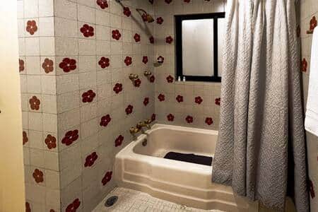 Tub: Private bathroom with a full tub for a luxurious and refreshing experience.