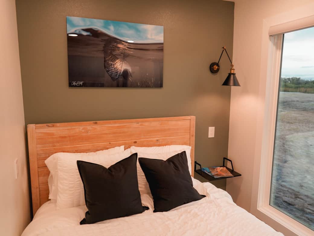 Bedroom: Queen bed with AC, TV, and outdoor view Bedroom: Queen bed with AC, TV, and outdoor view