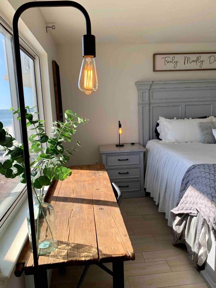 Spacious, one of a kind, vintage wood desk with adjustable black leather chair, if you have to work while traveling, such a perfect spot!  