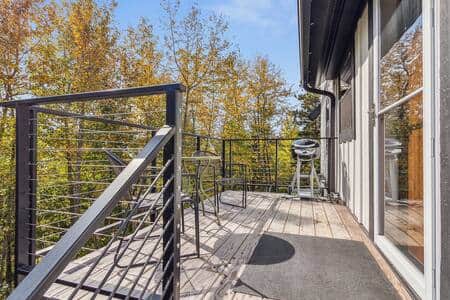 Private deck area off of the kitchen, perfect for grilling.