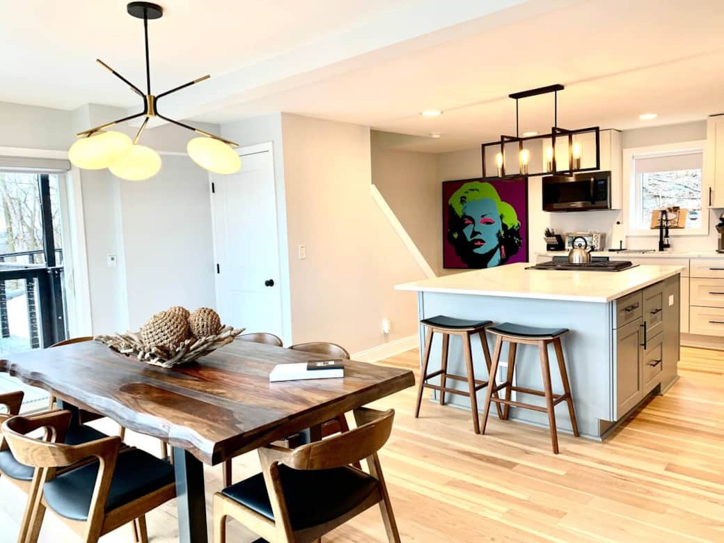 Live edge dining room table with West Elm light fixtures.  Seating for 6!

Plenty of prep space in the chef's kitchen.