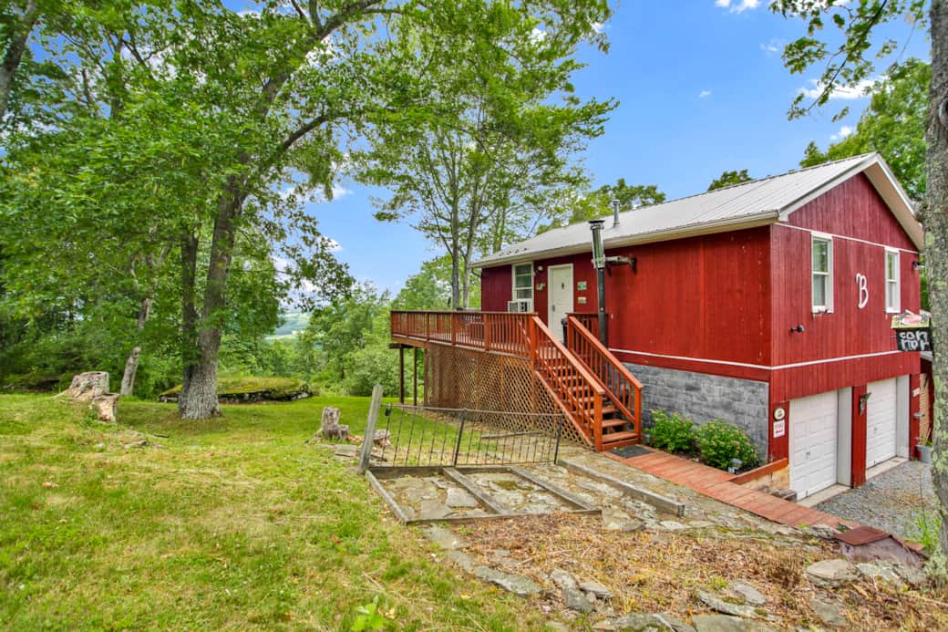 Villa with a View, 2 bedrooms, 1 bathroom, park at garage, entry is at the top of the steps on left.