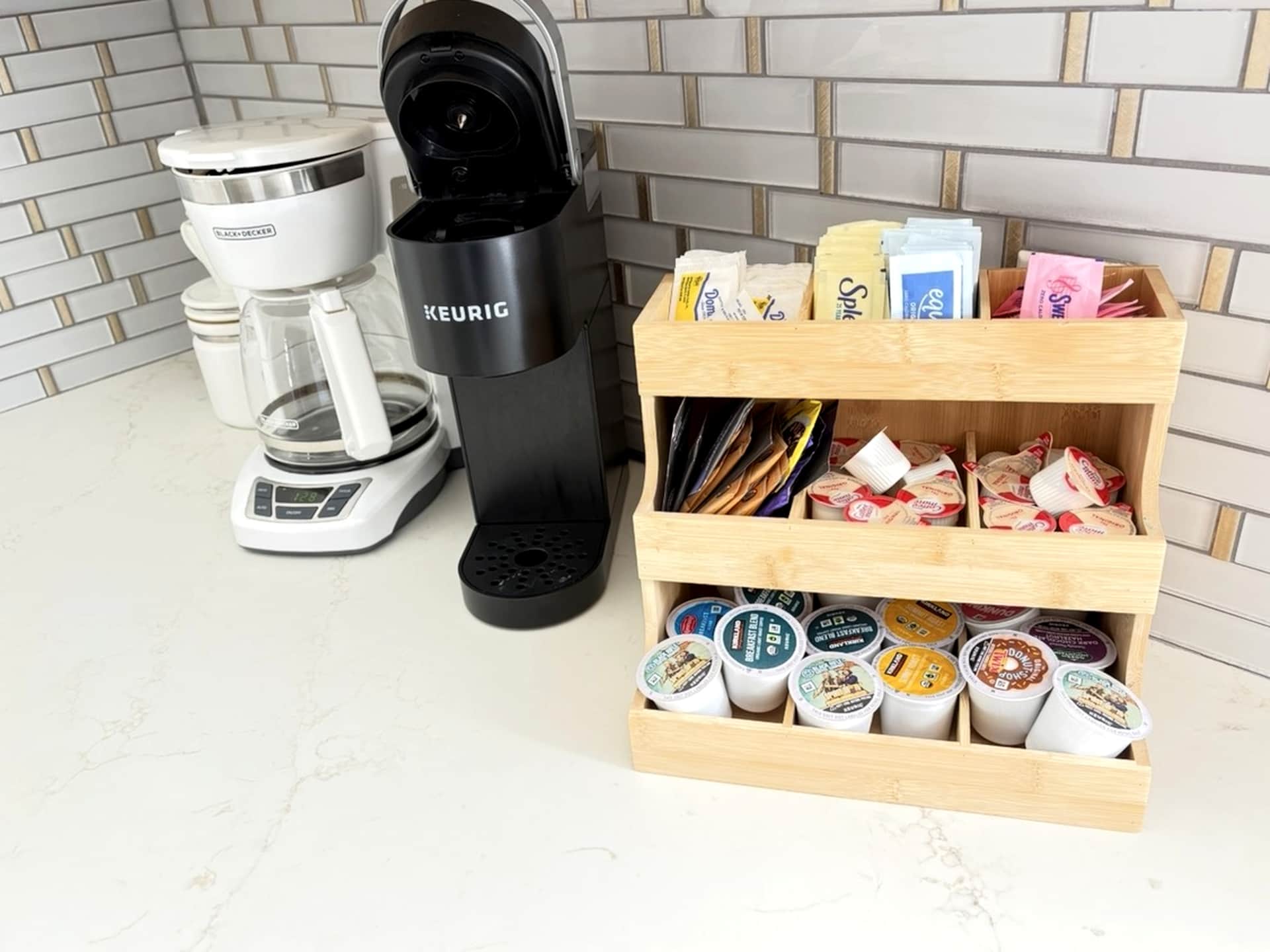 Coffee station with supplies in the kitchen at White Magnolia Galveston