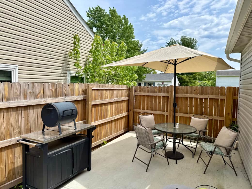 Outdoor dining overlooking the back yard