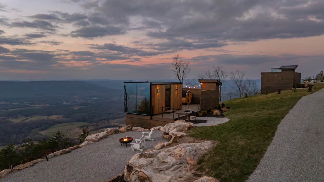 Welcome to the Glimmer Mirror Cabin, where forest views shimmer in a reflective hideaway.