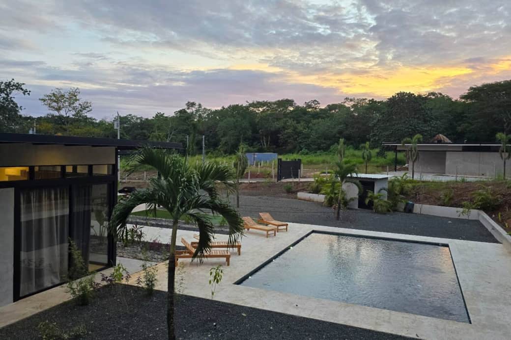 Large back yard, perfect for family event. large Baja pool and sitting area, sofa set and large dinning table sit 12 people. quite and private.  feel the luxury of Costa rica.
