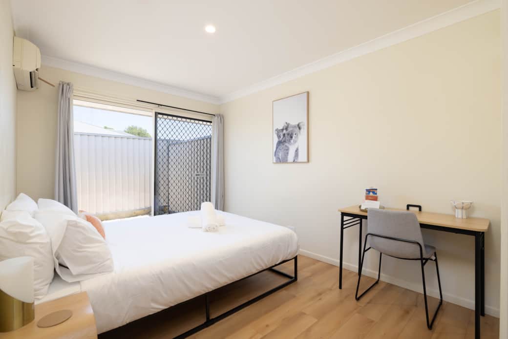 Bedroom 1: Peaceful bedroom with cozy design and ample storage