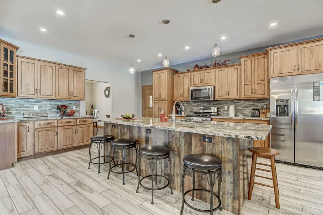 Fully stocked kitchen with modern appliances. Fully stocked kitchen with modern appliances.